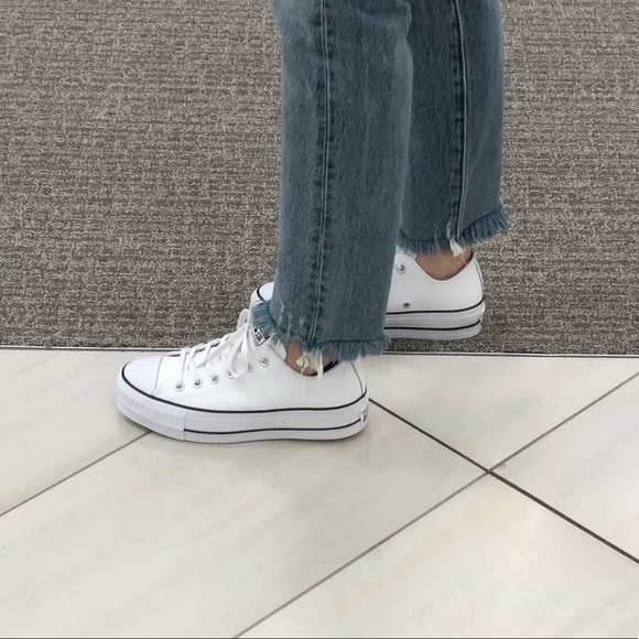 white leather converse lift